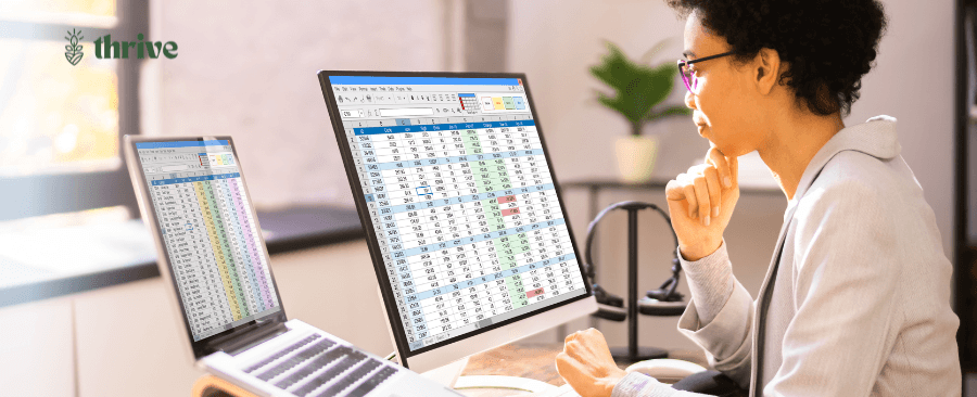 Practice billing staff reviewing prior authorization and claims data on a spreadsheet